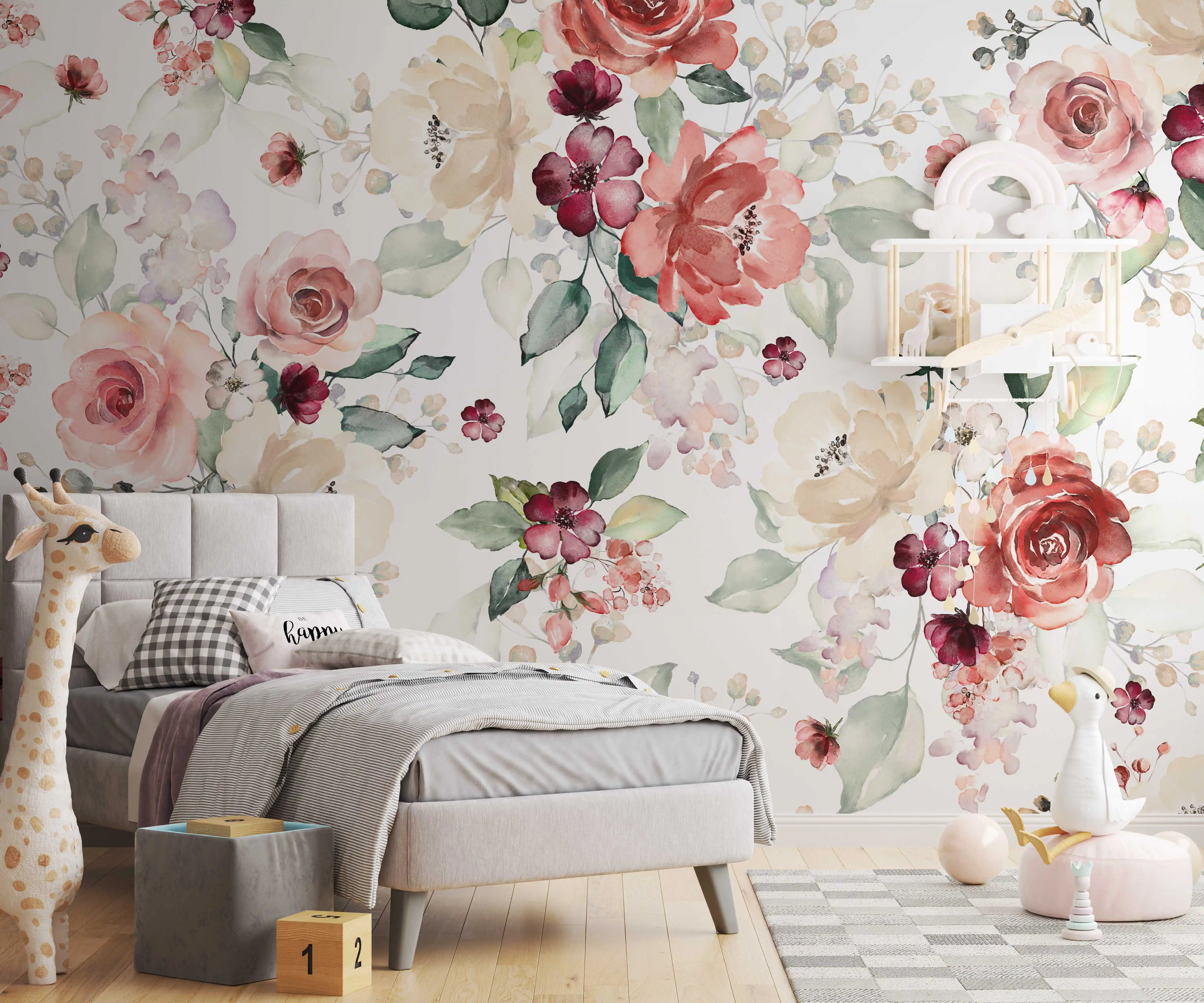 Kinderzimmer mit Fototapete Blütenpracht, rosa Rosen, grauem Polsterbett und Stoffgiraffe